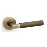 Alexander & Wilks AW200AB Hurricane Knurled Lever On Round Rose - Antique Brass (LEAD TIME: 2-3 DAYS)