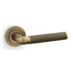 Alexander & Wilks AW210AB Harrier Knurled Lever On Round Rose - Antique Brass (LEAD TIME: 2-3 DAYS)